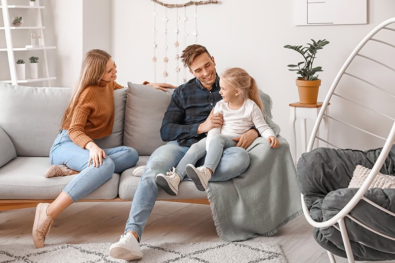 Happy family in living room, Using UV Lights for Air Purification | Indoor Air Quality | Port Orchard, WA